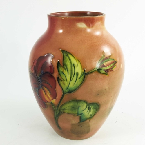 1091 - Walter Moorcroft, a flambe hibiscus vase, circa 1960, shouldered baluster form, impressed and painte... 