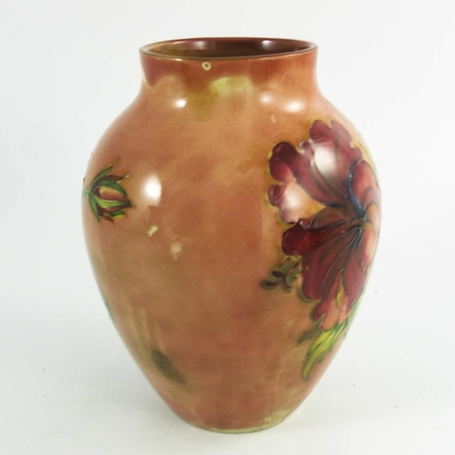 1091 - Walter Moorcroft, a flambe hibiscus vase, circa 1960, shouldered baluster form, impressed and painte... 