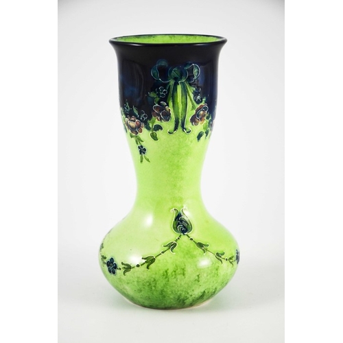 1102 - William Moorcroft for James MacIntyre, an Eighteenth Century on green vase, circa 1908, double gourd... 