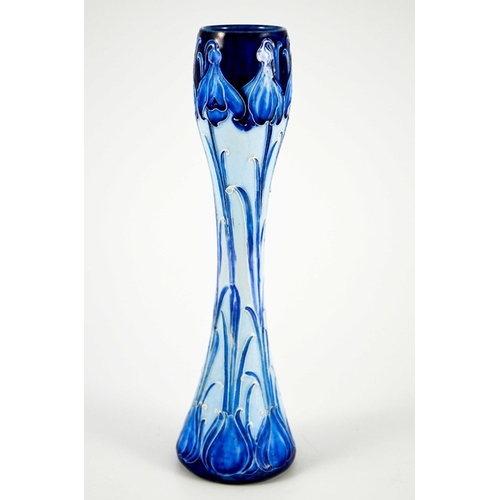 1104 - William Moorcroft for James MacIntyre, a Florian Ware Snowdrop vase, circa 1902, waisted elongated g... 