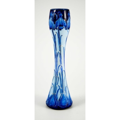 1104 - William Moorcroft for James MacIntyre, a Florian Ware Snowdrop vase, circa 1902, waisted elongated g... 