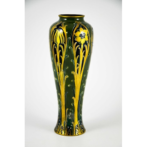 1105 - William Moorcroft for James MacIntyre, a Green and Gold Florian Ware vase, circa 1903, elongated inv... 