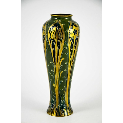 1105 - William Moorcroft for James MacIntyre, a Green and Gold Florian Ware vase, circa 1903, elongated inv... 