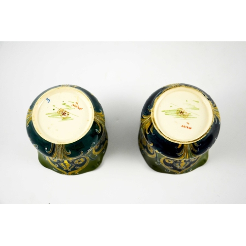 1107 - William Moorcroft for James MacIntyre, a mateched pair of Green and Gold Florian Ware vases, circa 1... 