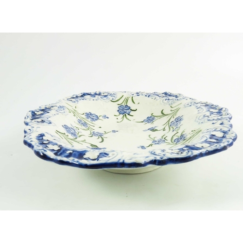 1111 - William Moorcroft for MacIntyre, a Buttercup scalloped dish, circa 1904, printed mark, 30cm wide