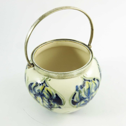 1112 - William Moorcroft for James Macintyre, an Iris biscuit barrel, circa 1905, retailed by JBC&S Ltd, im... 