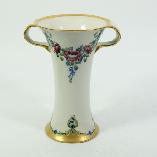 1113 - William Moorcroft for James MacIntyre, an eighteenth century pattern vase, circa 1903, twin handled ... 