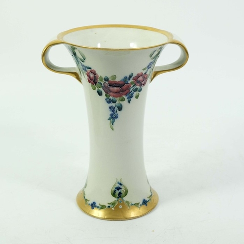 1113 - William Moorcroft for James MacIntyre, an eighteenth century pattern vase, circa 1903, twin handled ... 