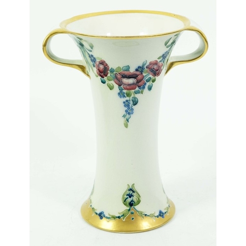 1113 - William Moorcroft for James MacIntyre, an eighteenth century pattern vase, circa 1903, twin handled ... 