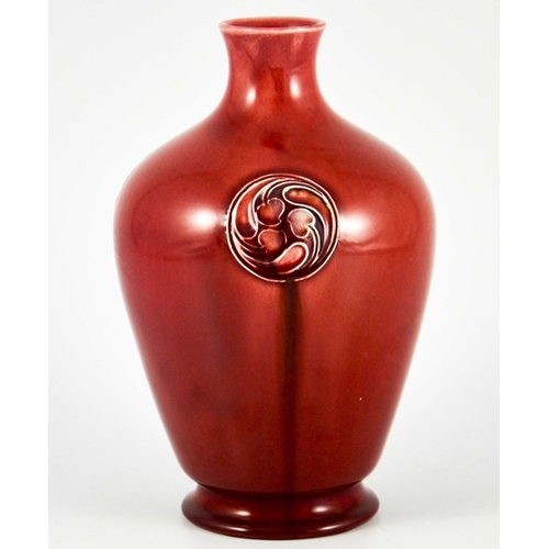 1118 - William Moorcroft for Liberty and Co., a Flamminian red vase, circa 1906, footed ovoid shouldered fo... 