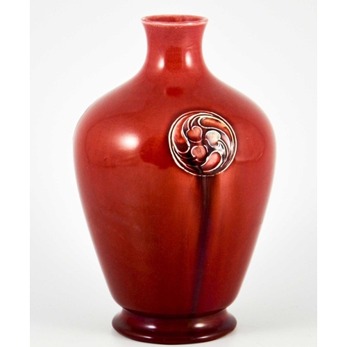 1118 - William Moorcroft for Liberty and Co., a Flamminian red vase, circa 1906, footed ovoid shouldered fo... 