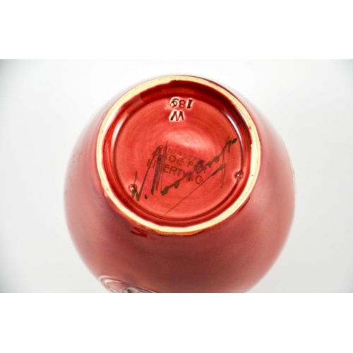 1119 - William Moorcroft for Liberty and Co., a small Flamminian red ginger jar, circa 1906, ovoid shoulder... 