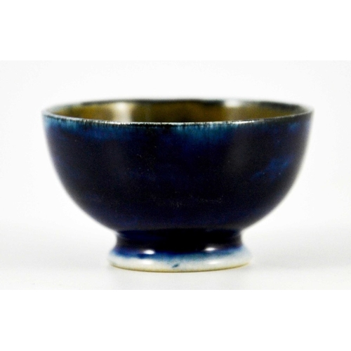 1129 - William Moorcroft, a miniature Big Poppy bowl, circa 1925, footed hemispherical form, impressed mark... 