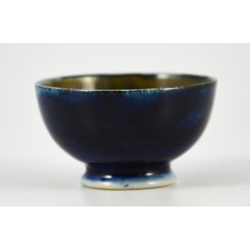 1129 - William Moorcroft, a miniature Big Poppy bowl, circa 1925, footed hemispherical form, impressed mark... 