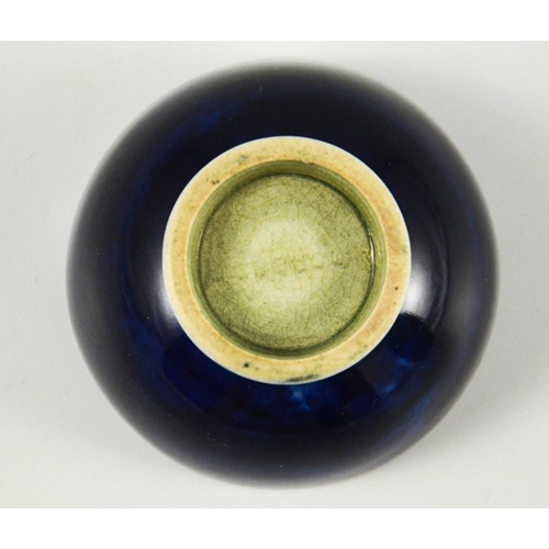 1129 - William Moorcroft, a miniature Big Poppy bowl, circa 1925, footed hemispherical form, impressed mark... 