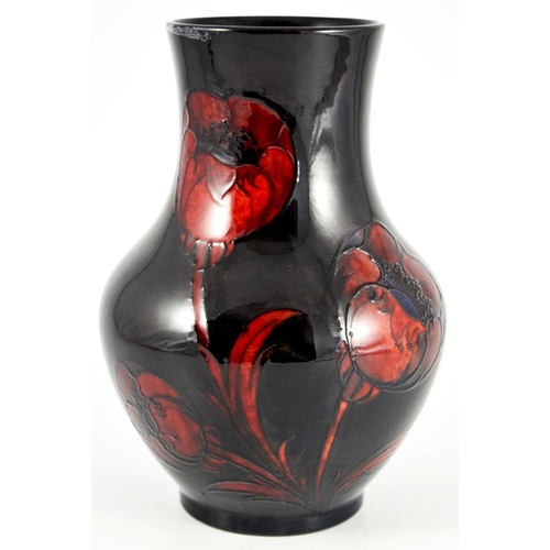 1138 - William Moorcroft, a Flambe Big Poppy vase, circa 1929, straight necked baluster form, impressed mar... 