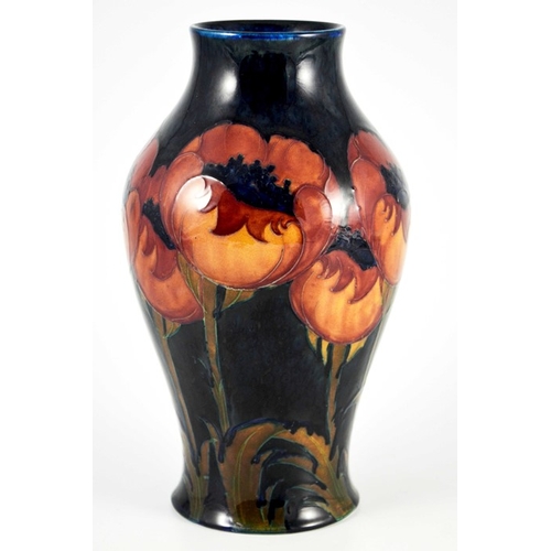 1141 - William Moorcroft, a Big Poppy vase, circa 1925, tapered shouldered form, impressed marks and underg... 