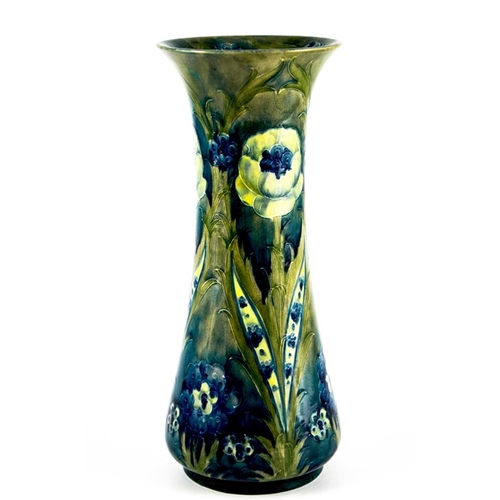 1143 - William Moorcroft, a Late Florian vase, circa 1920, waisted cylindrical form, impressed marks and un... 