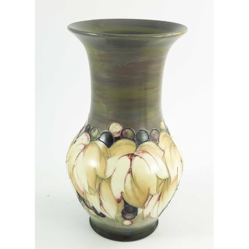 1150 - William Moorcroft, a Leaf and  Grape vase in a matt glaze, circa 1925, baluster form, impressed mark... 