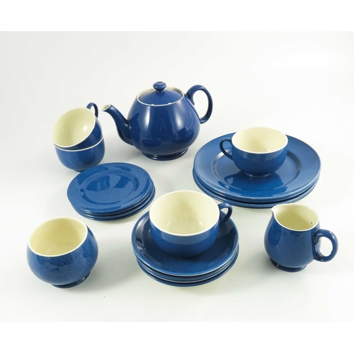 1151 - A William Moorcroft 'powder blue' tea service, comprising teapot and cover, milk jug, sugar, four cu... 