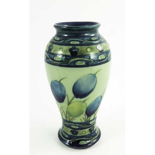 1152 - William Moorcroft, a Late Honesty  vase, circa 1930, baluster form, impressed and painted marks, 18.... 