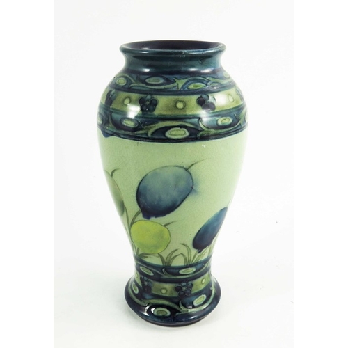 1152 - William Moorcroft, a Late Honesty  vase, circa 1930, baluster form, impressed and painted marks, 18.... 