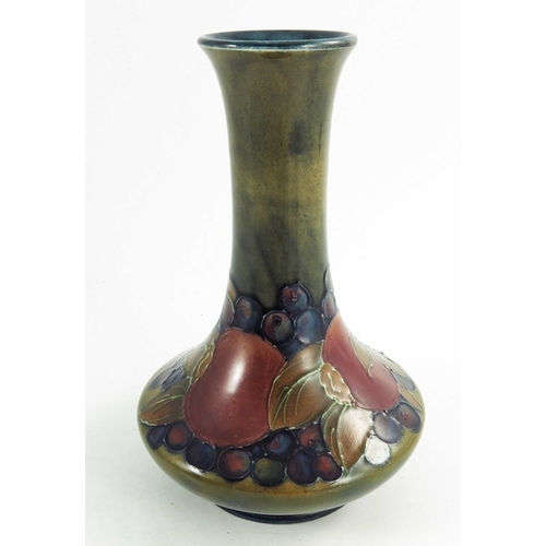 1159 - William Moorcroft, a Pomegranate vase, circa 1925, elongated neck angled baluster form, impressed an... 