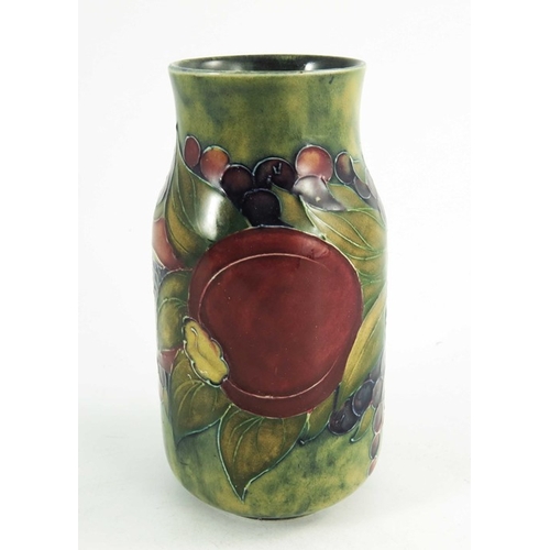 1160 - William Moorcroft, a Pomegranate on ochre vase, dated 1913, cylindrical form with waisted neck, pain... 