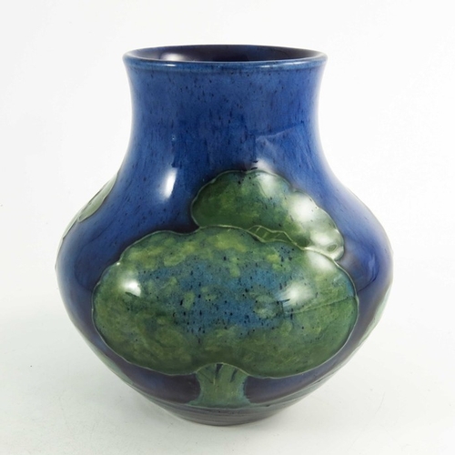 1162 - William Moorcroft, a Moonlit Blue vase, circa 1925, baluster form, impressed and painted marks, 13cm... 