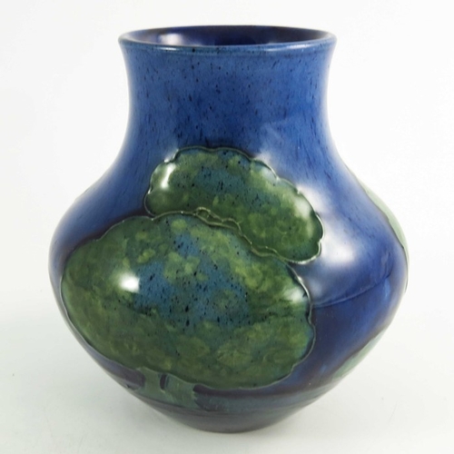 1162 - William Moorcroft, a Moonlit Blue vase, circa 1925, baluster form, impressed and painted marks, 13cm... 