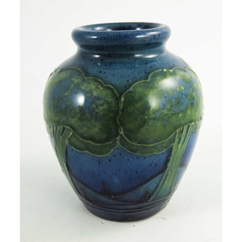 1163 - William Moorcroft, a Moonlit Blue vase, circa 1925, small baluster form, impressed and painted marks... 