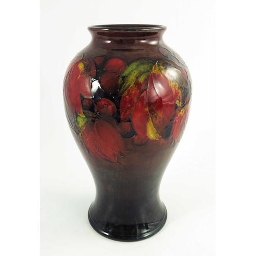 1167 - William Moorcroft, a Flambe Leaf and Berry vase, circa 1935, inverse baluster form, impressed facsim... 