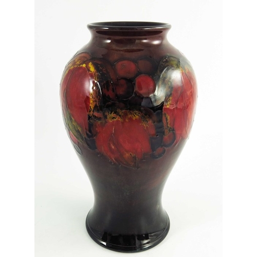 1167 - William Moorcroft, a Flambe Leaf and Berry vase, circa 1935, inverse baluster form, impressed facsim... 