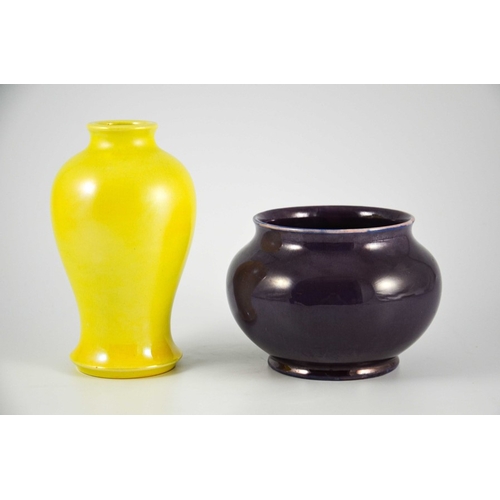 1171 - William Moorcroft, two lustre vases, circa 1916, including a yellow inverse baluster form vase and a... 