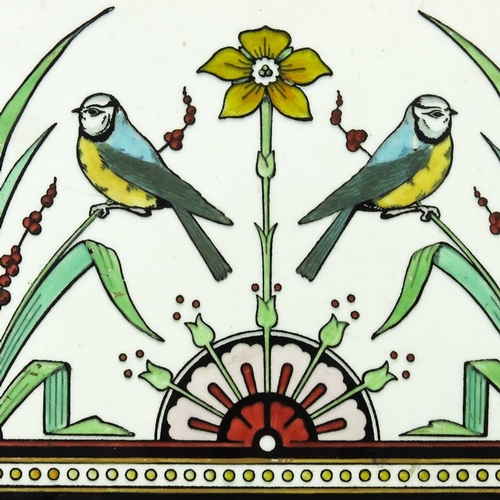 1180 - Christopher Dresser for Minton, a pair of Tomtits pattern tiles, circa 1870, white with enamelled bl... 