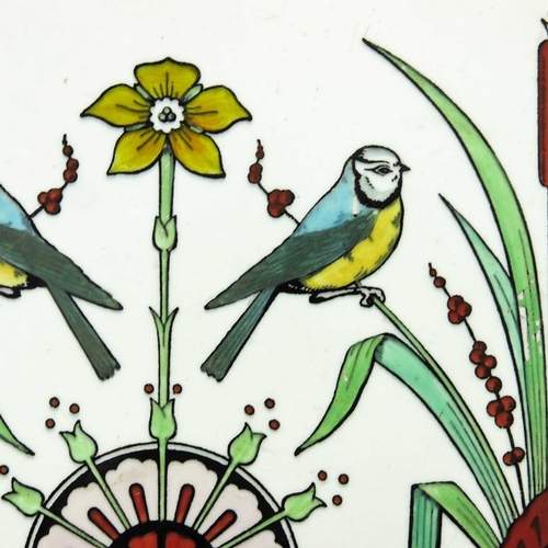 1180 - Christopher Dresser for Minton, a pair of Tomtits pattern tiles, circa 1870, white with enamelled bl... 