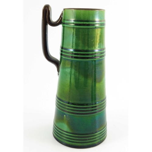 1184 - After Christopher Dresser, majolica glazed art pottery including Watcombe conical jug, Aller Vale go... 