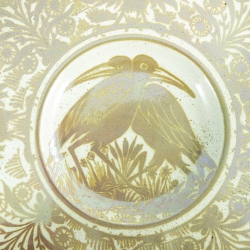 1191 - William De Morgan, a lustre dish, circa 1872-1882, painted with storks within a border of alternatin... 