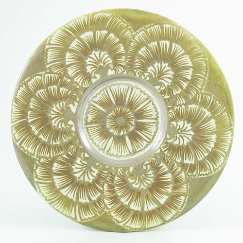 1192 - William De Morgan, a lustre dish, circa 1872-1882, painted with carnations, on a J H and J Davis bla... 