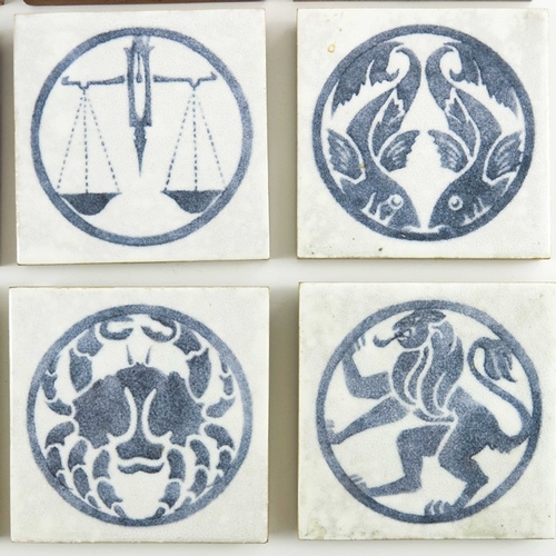 1212 - Polly Brace for Dunsmore, a set of ten Zodiac tiles, circa 1928, each with blue stencilled design, o... 