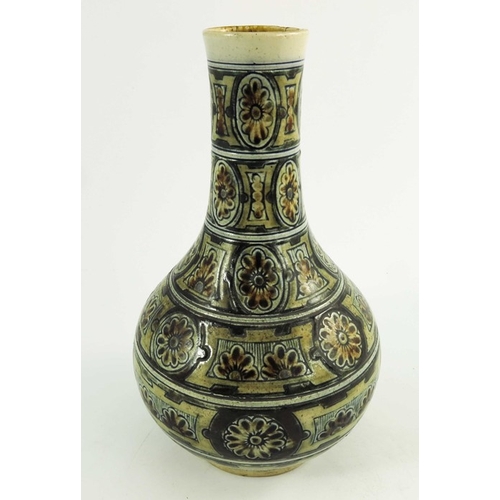 1224 - Robert Wallace Martin for Martin Brothers, a stoneware vase, 1880, bottle form with incised banding ... 