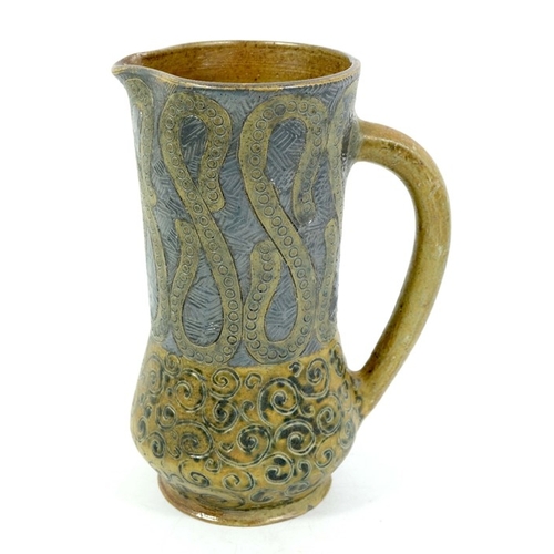 1226 - Robert Wallace Martin for Martin Brothers, a stoneware jug, incised with looped ribbon and sgraffito... 