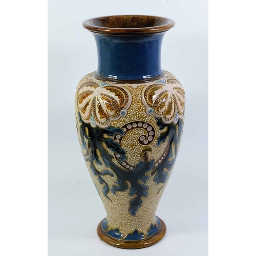 1235 - Frank Butler for Doulton Lambeth, a large stoneware vase, inverse baluster form, relief moulded and ... 