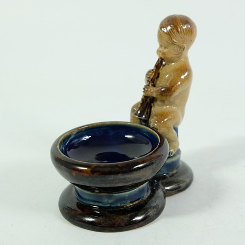 1241 - George Tinworth for Doulton Lambeth, a stoneware figural salt cellar or bibelot, modelled as a boy p... 