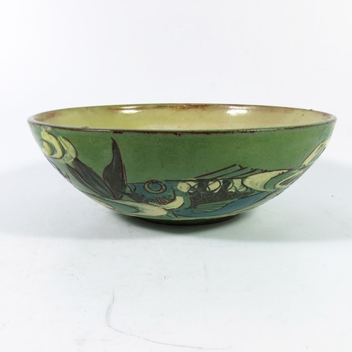 1248 - C H Brannam, an art pottery bowl, 1892, sgraffito decorated with fish in aquatic ground with slip hi... 