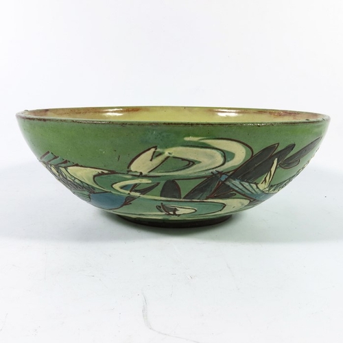 1248 - C H Brannam, an art pottery bowl, 1892, sgraffito decorated with fish in aquatic ground with slip hi... 