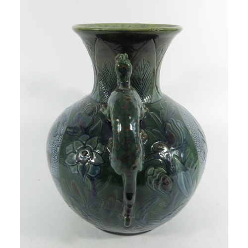 1250 - James Dewdney for C H Brannam, an art pottery twin handled dragon vase, 1898, ovoid form with flared... 