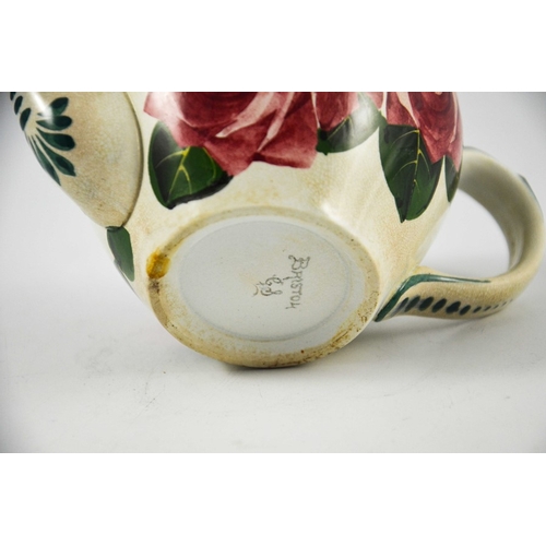 1252 - George Stewart for Pountney, a Bristol pottery rose painted teapot, circa 1905, in the Wemyss style,... 