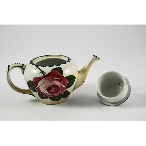 1252 - George Stewart for Pountney, a Bristol pottery rose painted teapot, circa 1905, in the Wemyss style,... 