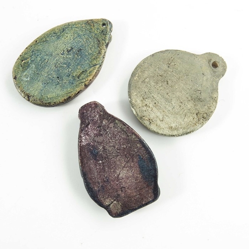 1260 - Mary Watts for Compton Pottery, three ceramic pendants, relief moulded, including St Catherine, St C... 